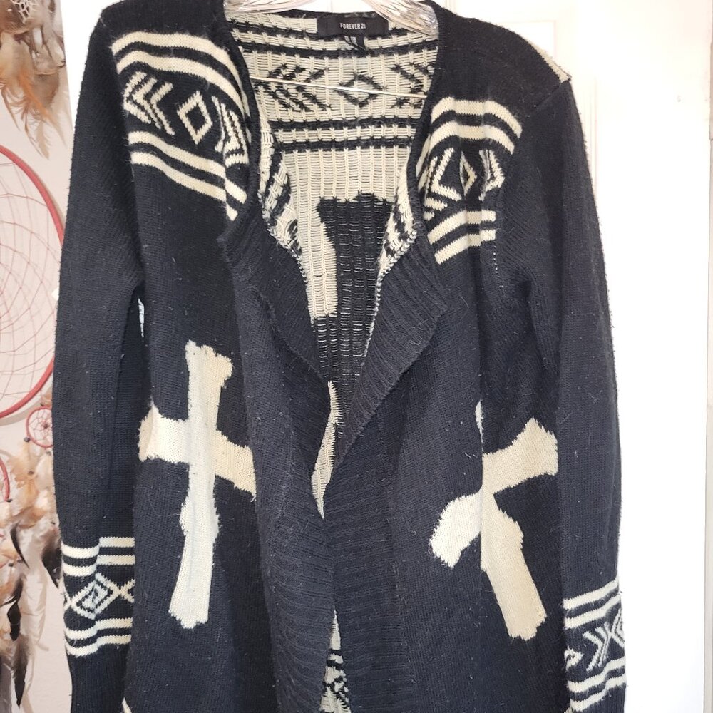 Cross sweater